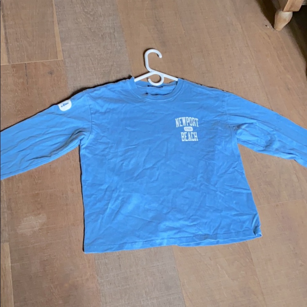 blue long sleeved t shirt